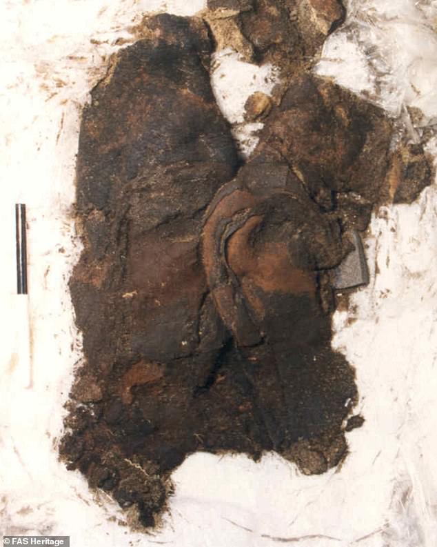 The boots (pictured) were described as well-preserved and were found in what was the coffin of a man who died in the 1400s