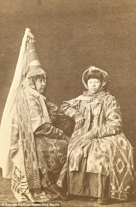 In one stunning photo a Kazakh bride (left) is pictured wearing a saukele hat, a traditional garment passed down from generation to generation