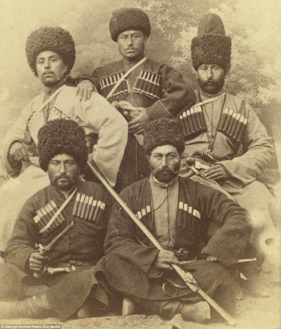 In one picture post card, Kennan captured this group of five Chechen men attending a wedding. They were all wearing traditional head wear and carrying weapons