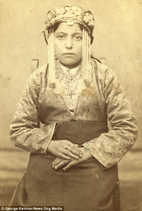 An unknown woman is shown in traditional clothing in another picture