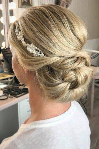 wedding bun hairstyles blond bun with headpiece janniebaltzer